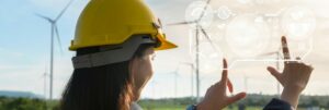 An Engineer in a field of Wind turbines